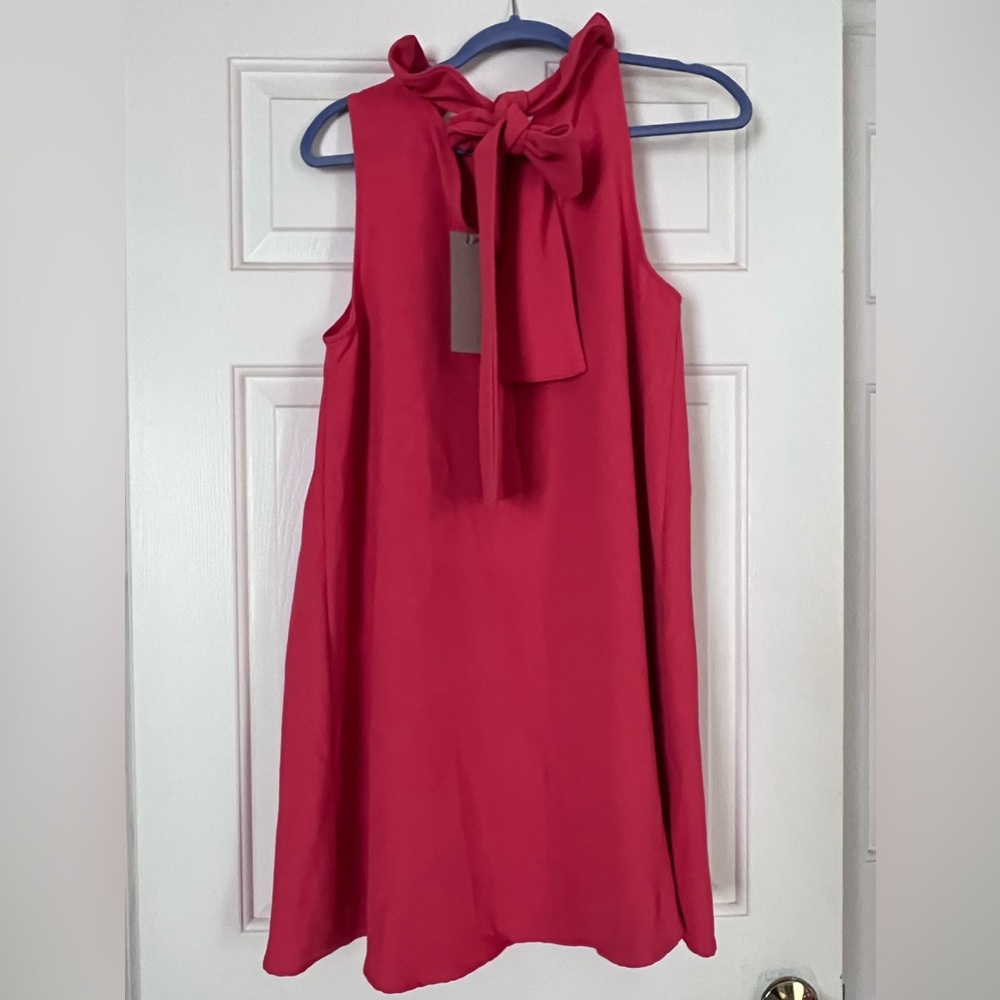 Coral ruffle neck bow back dress